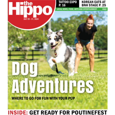 front cover of the Hippo with a happy dog running on a lawn, woman standing behind him, sunny day, title in bold letters Dog adventures