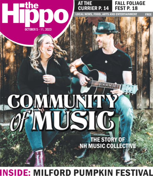 cover page showing man and woman sitting on grass in front of wooden wall, man holding guitar, with text Community of Music