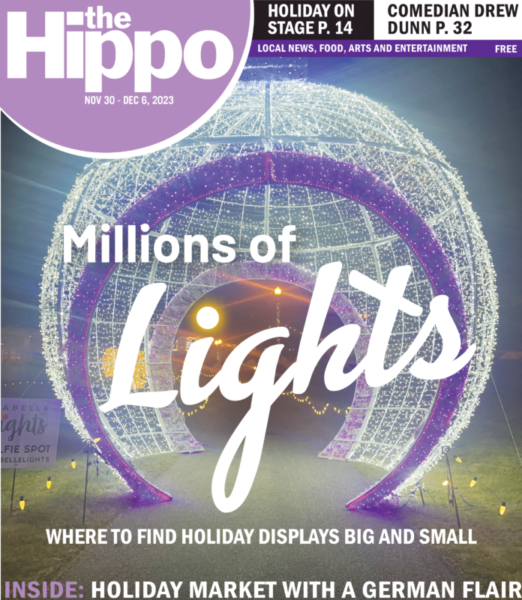 front page with text Millions of Light showing large sphere made of lots of christmas lights