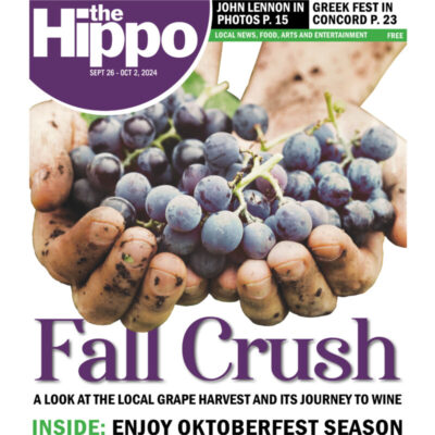 front of Hippo news showing hands holding out picked grapes, title words Fall Crush