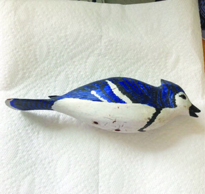 carved wooden blue jay, painted, wings folded, no legs or feet