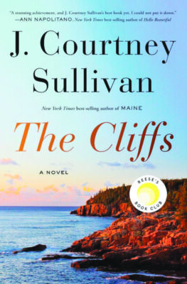 book cover for the Cliffs by J. Courtney Sullivan showing photo of cliffs along ocean sunrise turning cliffs a warm glow