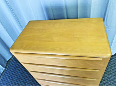 simple, light wooden dresser seen from above