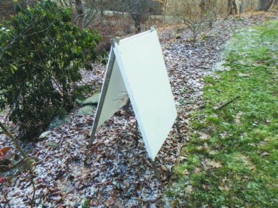 wooden a-frame in garden during fall