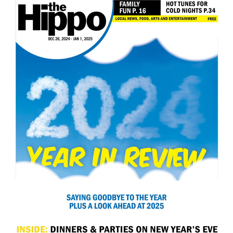 A Hippo magazine cover depicting the year 2024 written in clouds, which slowly fades away into a blue background framed by fluffy clouds