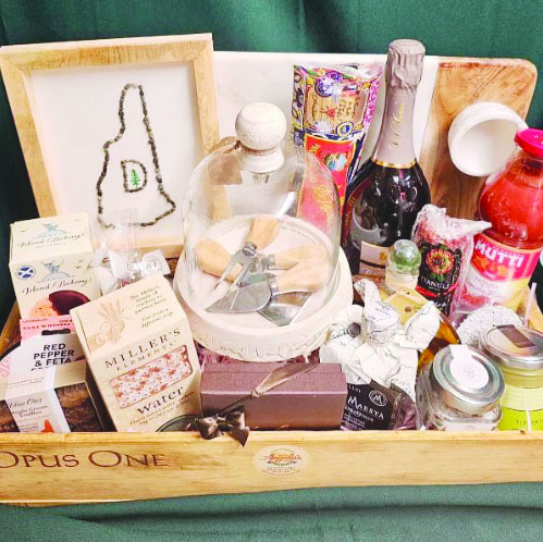 wooden box filled with food and kitchen items