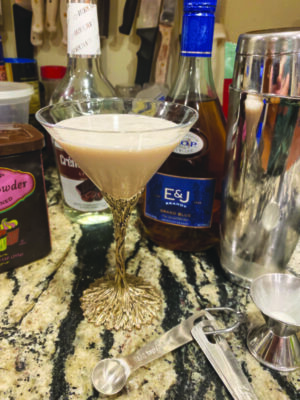 Picture of a Brandy Alexander cocktail in a fancy glass.