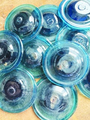 A pile of deep blue bullseye glass