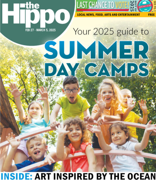 A Hippo cover about summer camps with a group of kids smiling and laughing