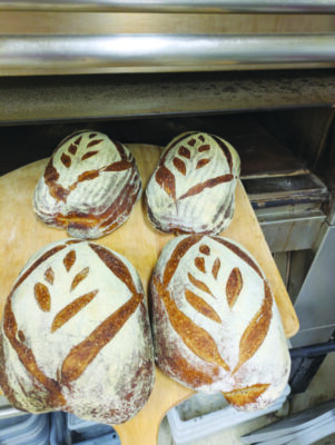 For loaves of raditional European style bread made by Woodman’s Artisan Bakery.