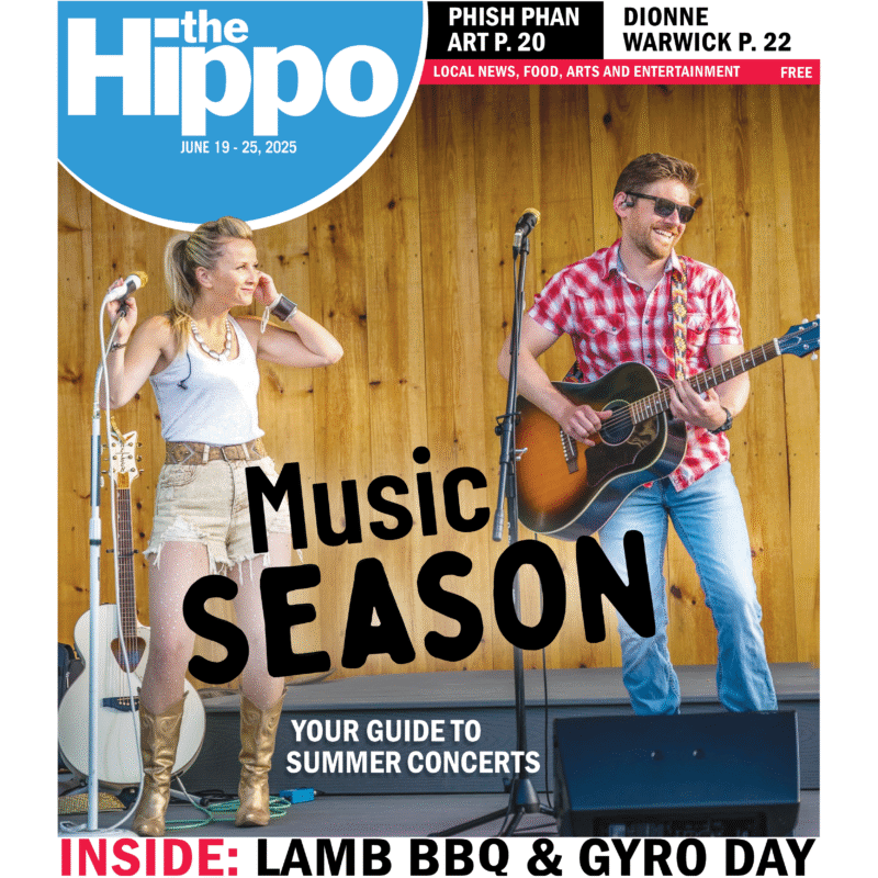 front page of the Hippo showing a female and male musician on stage
