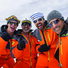 screenshot from Mountainhead showing the four lead actors taking a selfie while on the mountain