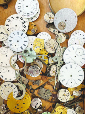 pile of small clock faces