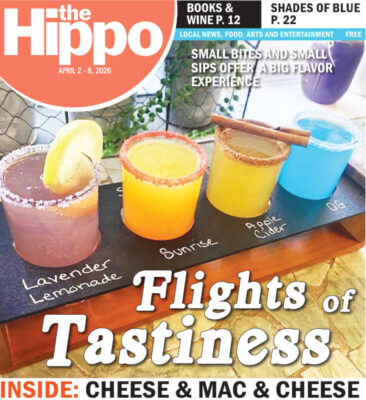 front cover of the Hippo showing a flight of colorful mimosas
