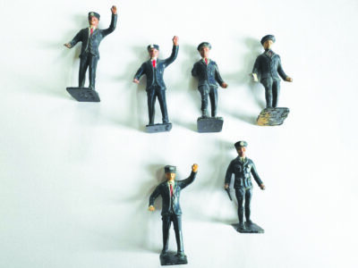 small figurines standing in different poses