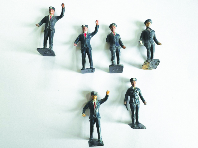 small figurines standing in different poses