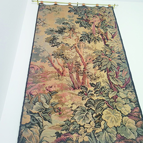 tapestry showing leafy forest scene