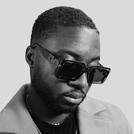 black and white portrait of black man wearing sunglasses, looking serious