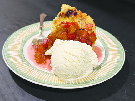 Steamed pudding with rhubarb sauce