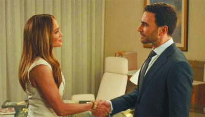 screenshot from Office Romance showing Jennifer Lopez and Brett Goldstein shaking hands