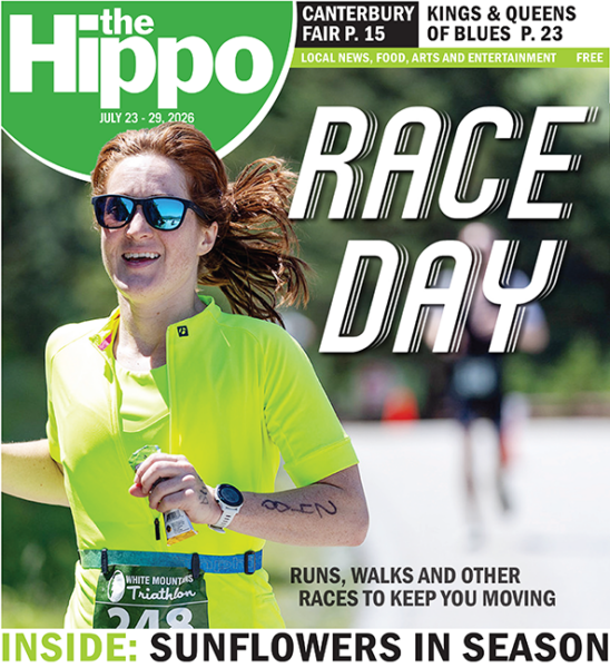 frontpage of Hippo showing woman in bright green shirt with number on label around her waist as she runs a road race