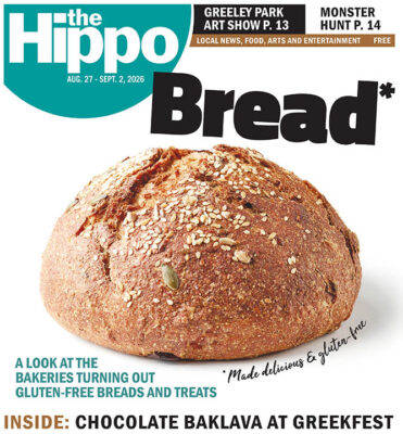 frontpage of Hippo with round loaf of bread on white background