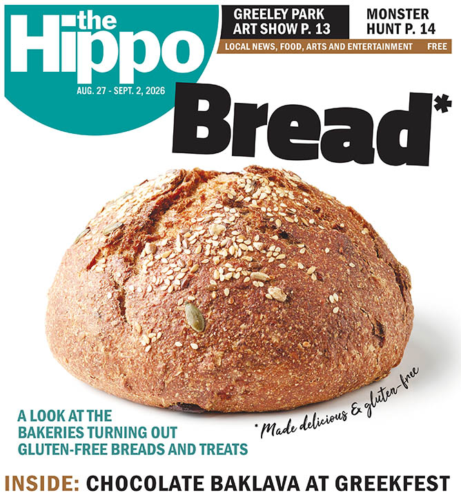 frontpage of Hippo with round loaf of bread on white background