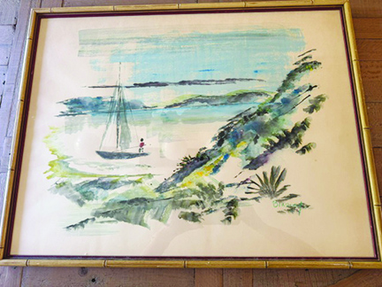 framed painting of sailboat in tropical ocean