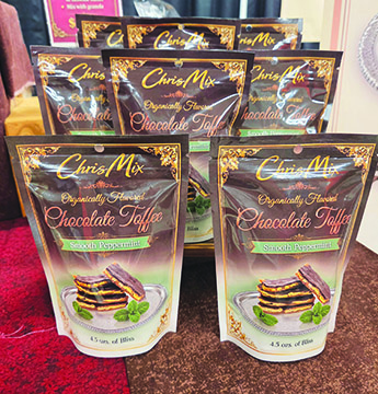 standing bags of toffee pieces, lined up in rows