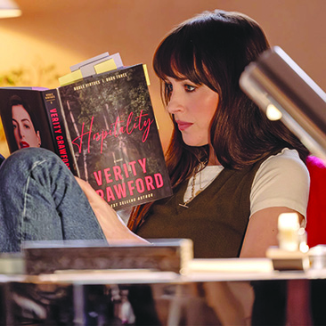screenshot from Verity showing woman reading book
